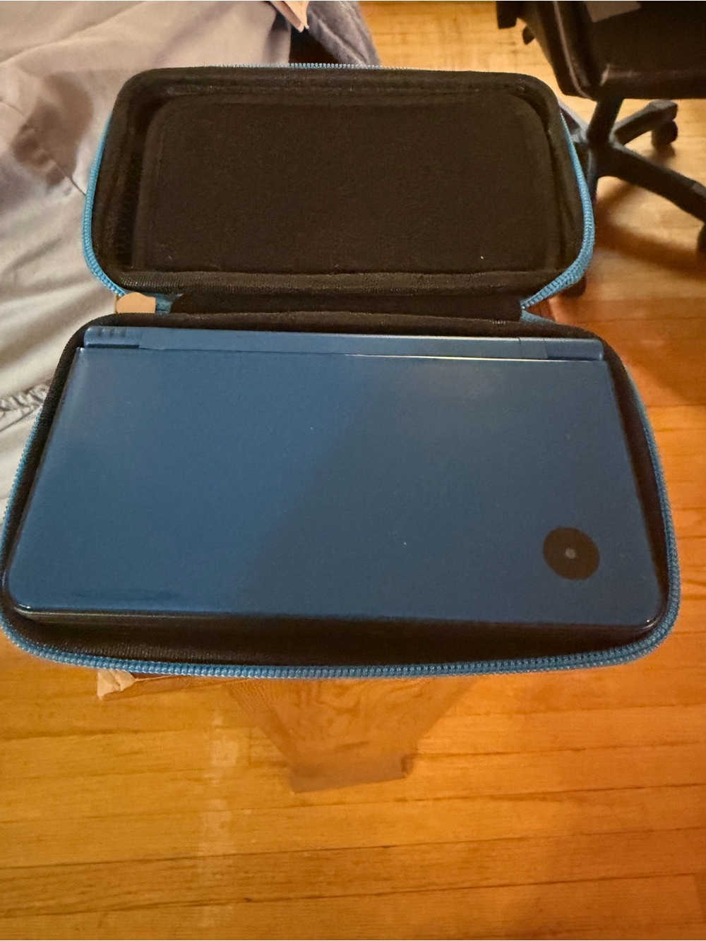 Blue Nintendo dsi Handheld Gaming Console in Protective Zip Case